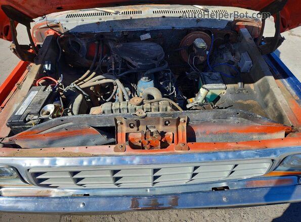 F14BRFA5215 1979 FORD F150 Orange Vista interior trasera
