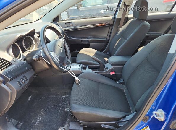 JA32U2FU1GU600532 2016 MITSUBISHI LANCER Blue Вид салону спереду