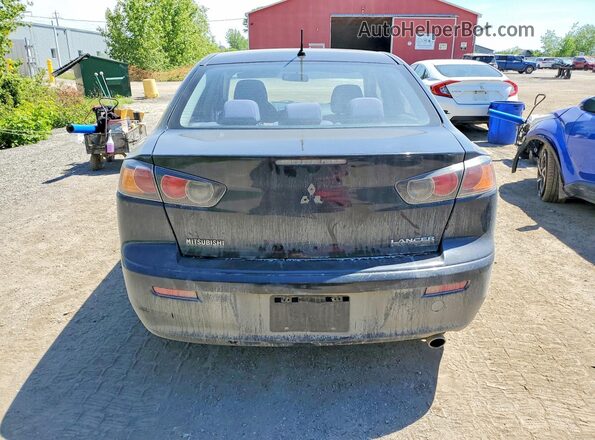 JA32U2FU6GU600347 2016 MITSUBISHI LANCER Black Вид ззаду