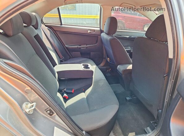 JA32U2FU6HU005127 2017 MITSUBISHI LANCER Gray Rear seats view