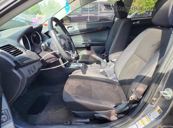 JA32U2FU6HU005127 2017 MITSUBISHI LANCER Gray Front interior view