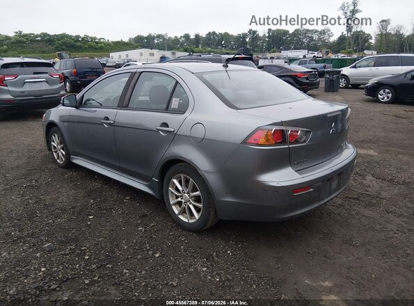 JA32U2FU8GU007217 2016 MITSUBISHI LANCER Silver Trasero izquierdo