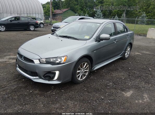 JA32U2FU8GU007217 2016 MITSUBISHI LANCER Silver Vista tres cuartos delantera izquierda