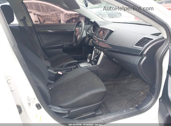 JA32U2FUXGU007381 2016 MITSUBISHI LANCER Белый Вид салона спереди