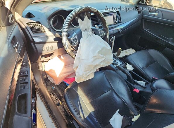 JA32V2FW0GU603923 2016 MITSUBISHI LANCER White Առջևի վահանակի տեսք