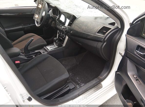 JA32V2FW5GU011627 2016 MITSUBISHI LANCER White Front interior view