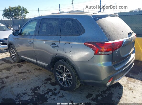 JA4AD2A34GZ005585 2016 MITSUBISHI OUTLANDER Gray Trasero izquierdo