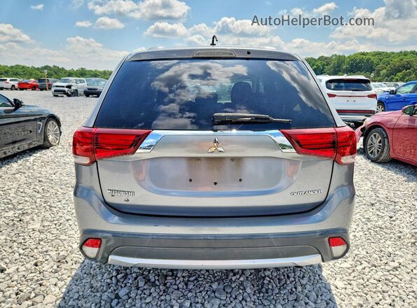 JA4AD2A3XGZ004215 2016 MITSUBISHI OUTLANDER Silver უკანა ხედი