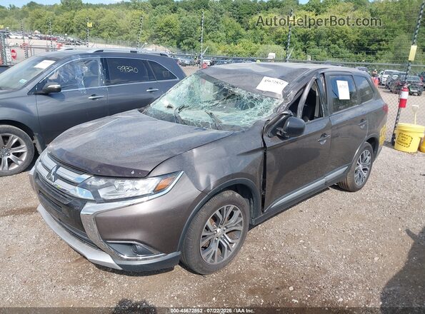 JA4AD2A3XHZ066487 2017 MITSUBISHI OUTLANDER Brown Vista tres cuartos delantera izquierda