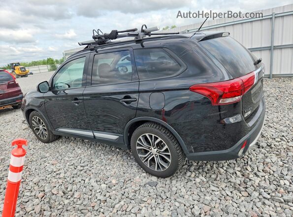 JA4AD3A32GZ011259 2016 MITSUBISHI OUTLANDER Black Trasero izquierdo