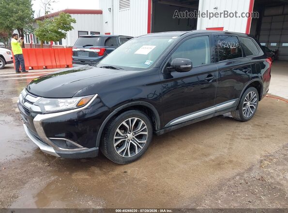 JA4AD3A34HZ055863 2017 MITSUBISHI OUTLANDER Черный Передняя левая четверть