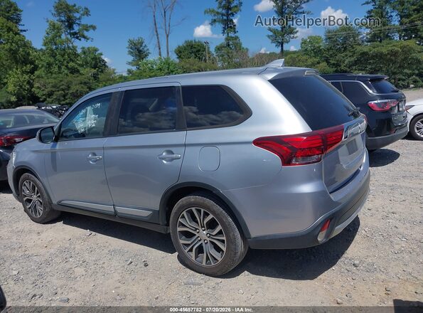 JA4AD3A39HZ000261 2017 MITSUBISHI OUTLANDER Silver Rear interior view