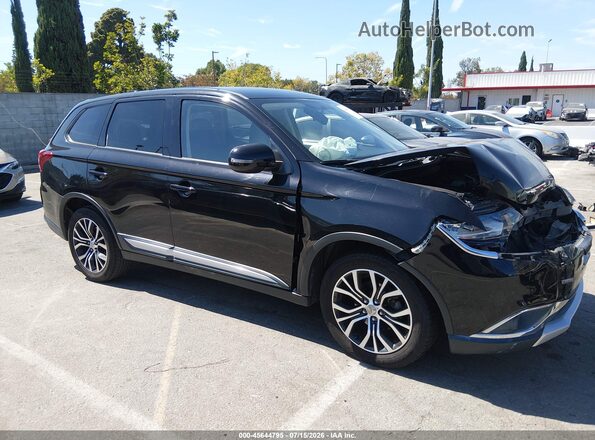 JA4AD3A39JZ042497 2018 MITSUBISHI OUTLANDER Black Սալոնի հետևի տեսք