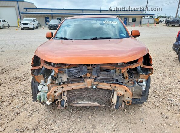 JA4AP3AU0LU009761 2020 MITSUBISHI OUTLANDER Orange Вид спереду