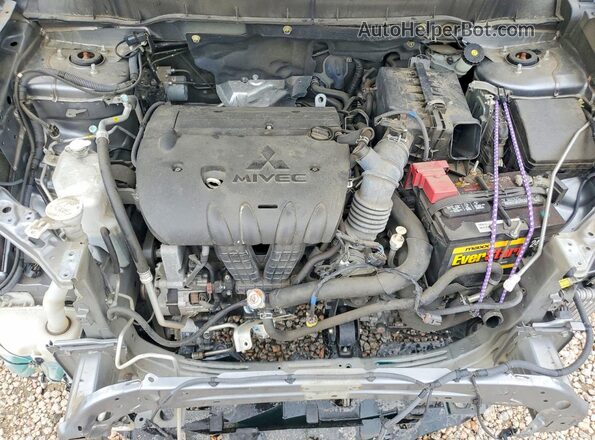JA4AP3AU5KU024710 2019 MITSUBISHI OUTLANDER Gray Vista del compartimento del motor