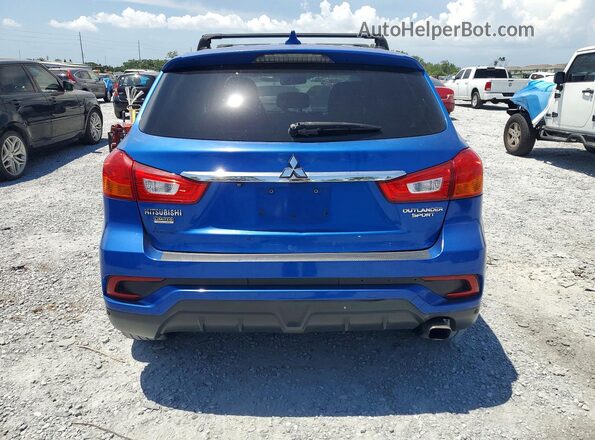 JA4AP3AUXJU014303 2018 MITSUBISHI OUTLANDER Blue Rear view