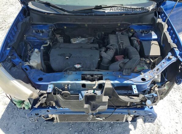 JA4AP3AUXJU014303 2018 MITSUBISHI OUTLANDER Blue Engine compartment view