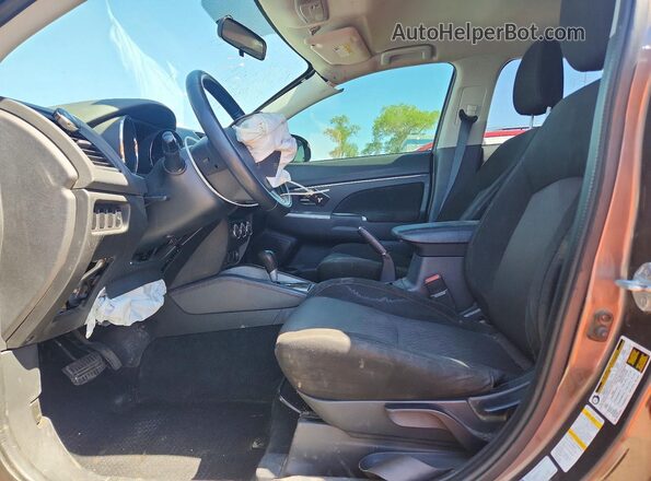 JA4AP4AUXKU005771 2019 MITSUBISHI OUTLANDER Brown Vista interior delantera