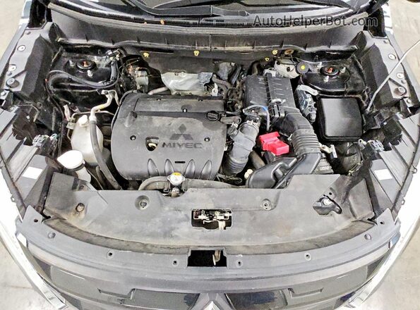 JA4APUAU0MU031248 2021 MITSUBISHI OUTLANDER Black Engine compartment view