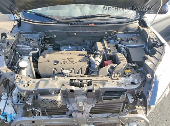 JA4APUAU2MU024429 2021 MITSUBISHI OUTLANDER Silver Вид задньої частини салону