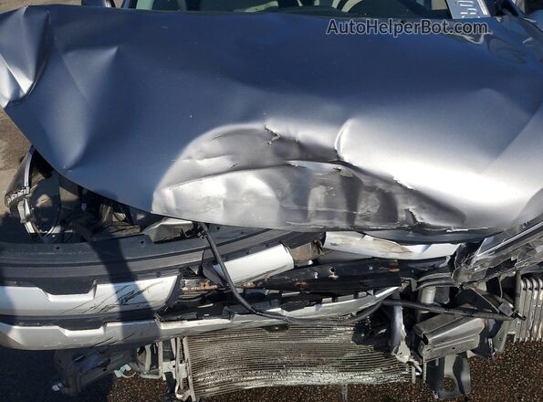 JA4APUAU5MU004188 2021 MITSUBISHI OUTLANDER Silver Vista del compartimento del motor