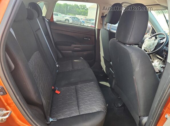 JA4APUAU7NU009541 2022 MITSUBISHI OUTLANDER Orange Widok wnętrza z tyłu