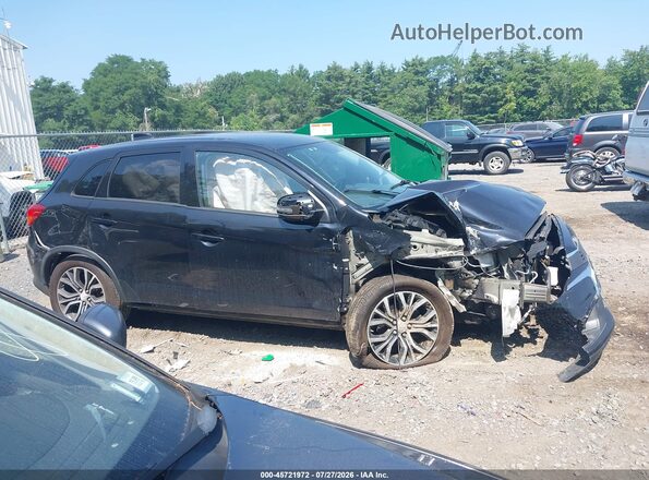 JA4AR3AUXHZ005298 2017 MITSUBISHI OUTLANDER SPORT Black Widok wnętrza z tyłu