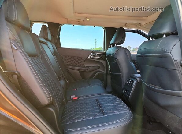 JA4J4VA85PZ042058 2023 MITSUBISHI OUTLANDER Brown Rear interior view