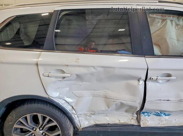 JA4JZ4AX5HZ067434 2017 MITSUBISHI OUTLANDER White Vista de los asientos traseros