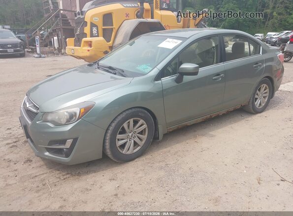 JF1GJAB62GH022277 2016 SUBARU IMPREZA Зеленый Передняя левая четверть