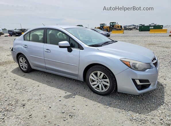 JF1GJAB64GH004282 2016 SUBARU IMPREZA Silver Front right