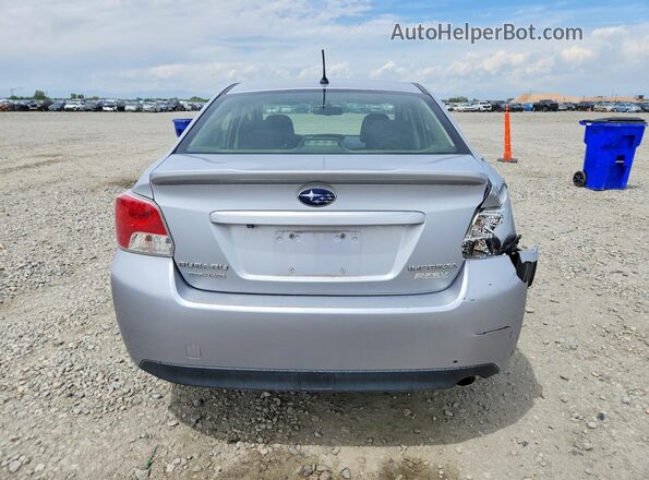 JF1GJAB64GH004282 2016 SUBARU IMPREZA Silver Rear view