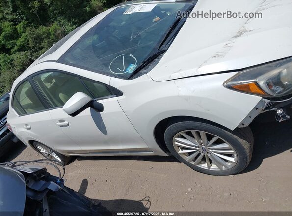 JF1GJAF68GH021922 2016 SUBARU IMPREZA White Вид задньої частини салону