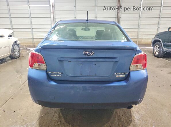 JF1GJAF69GH013361 2016 SUBARU IMPREZA Blue Вид ззаду
