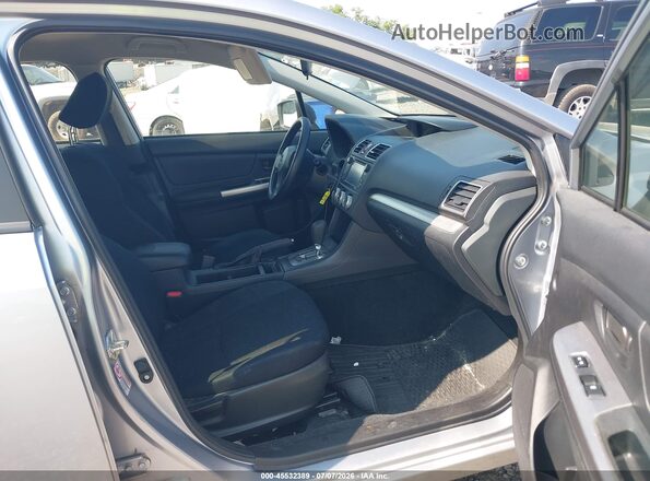 JF1GPAA65G8329491 2016 SUBARU IMPREZA Silver Front interior view