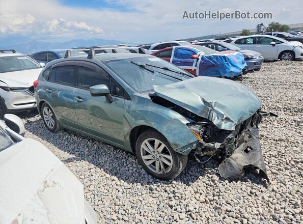 JF1GPAB67GH350115 2016 SUBARU IMPREZA Зеленый Передняя правая четверть