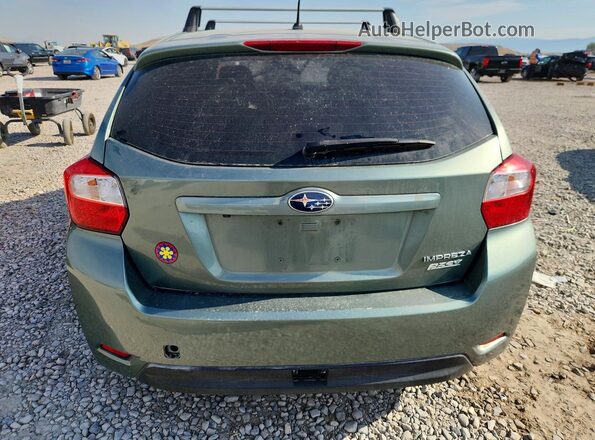JF1GPAB67GH350115 2016 SUBARU IMPREZA Зеленый Вид сзади