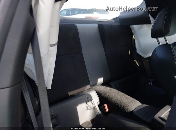 JF1ZNBE16T8076887 2026 TOYOTA GR86 Black VIN კოდის სტიკერის ხედი