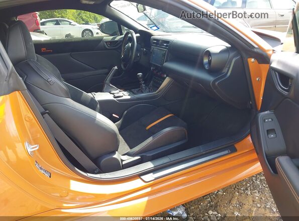 JF1ZNBG13P9756114 2023 TOYOTA GR86 Orange Widok wnętrza z przodu