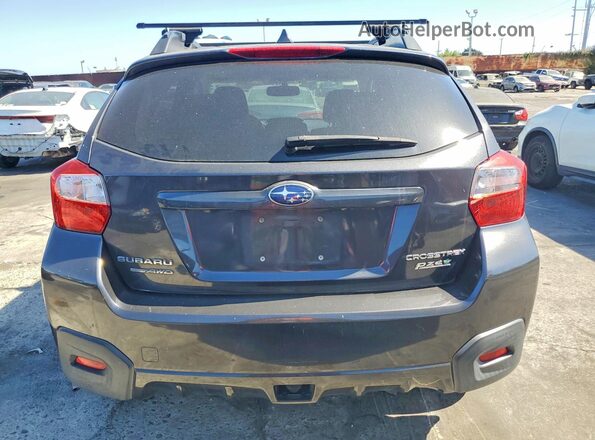 JF2GPABC0G8290163 2016 SUBARU CROSSTREK Gray Rear view