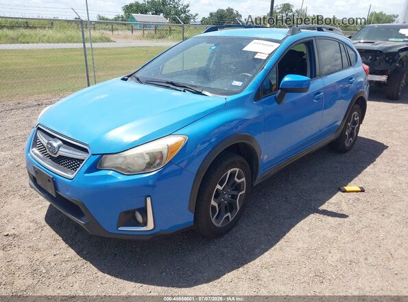 JF2GPABC6G8306978 2016 SUBARU CROSSTREK Light Blue Առջևի ձախ երեք քառորդ տեսարան