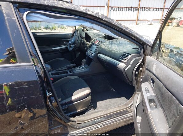JF2GPABCXG8302268 2016 SUBARU CROSSTREK Black Front interior view