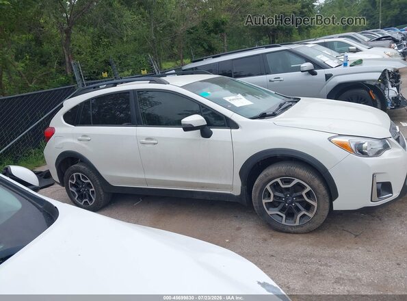 JF2GPAKC1HH237411 2017 SUBARU CROSSTREK White Vista interior trasera