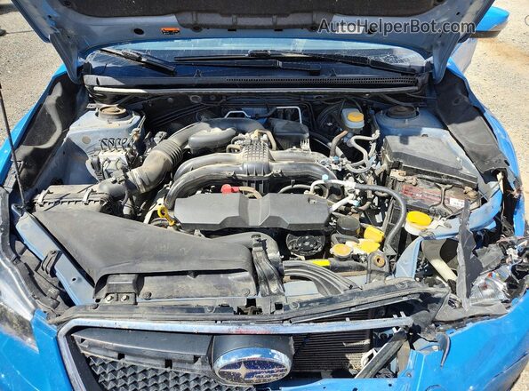 JF2GPAKCXH8213124 2017 SUBARU CROSSTREK Blue Vista interior trasera