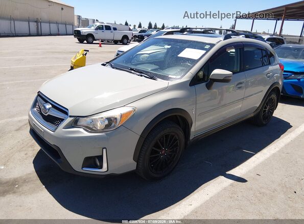 JF2GPANC2GH294422 2016 SUBARU CROSSTREK Gold Vista tres cuartos delantera izquierda