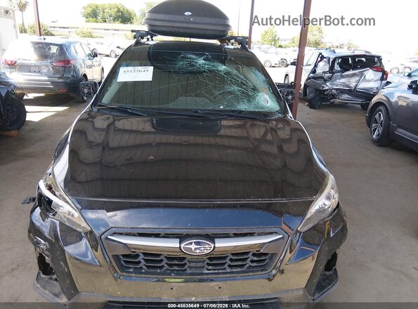 JF2GTAAC3JH280344 2018 SUBARU CROSSTREK Black Rear interior view