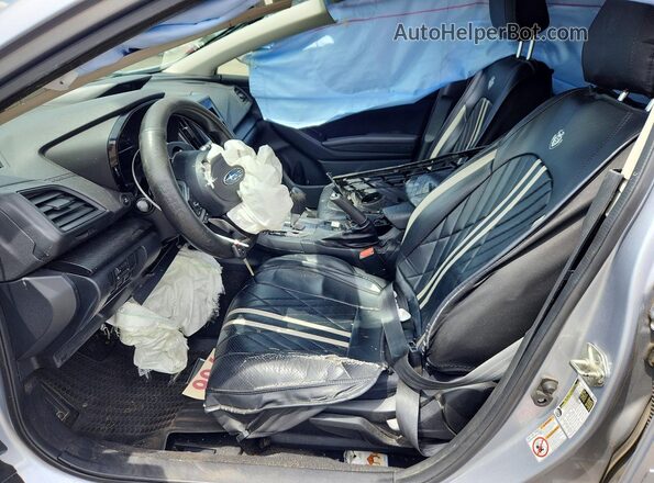 JF2GTABC3KH330529 2019 SUBARU CROSSTREK Серебряный Вид салона спереди