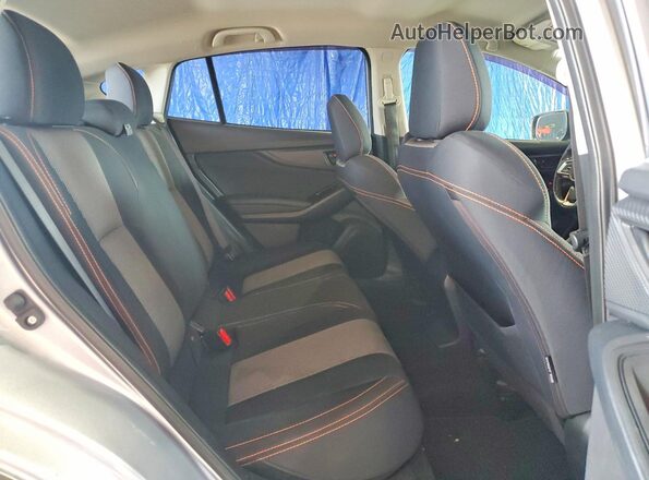 JF2GTABC9JH215612 2018 SUBARU CROSSTREK Silver Rear interior view