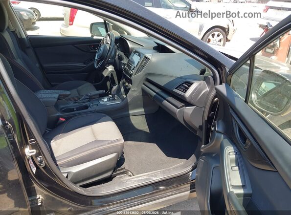 JF2GTABCXJH303164 2018 SUBARU CROSSTREK Black Front interior view
