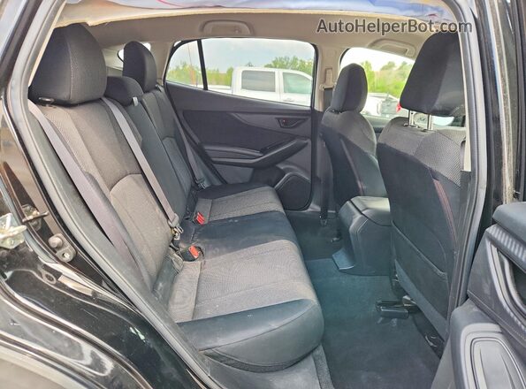 JF2GTABCXMH239065 2021 SUBARU CROSSTREK Black Vista interior trasera